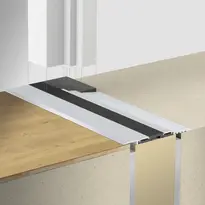 Planet F130 click-threshold with frame sealing pad, ideal for new constructions (image: frame mounted on top of pad)